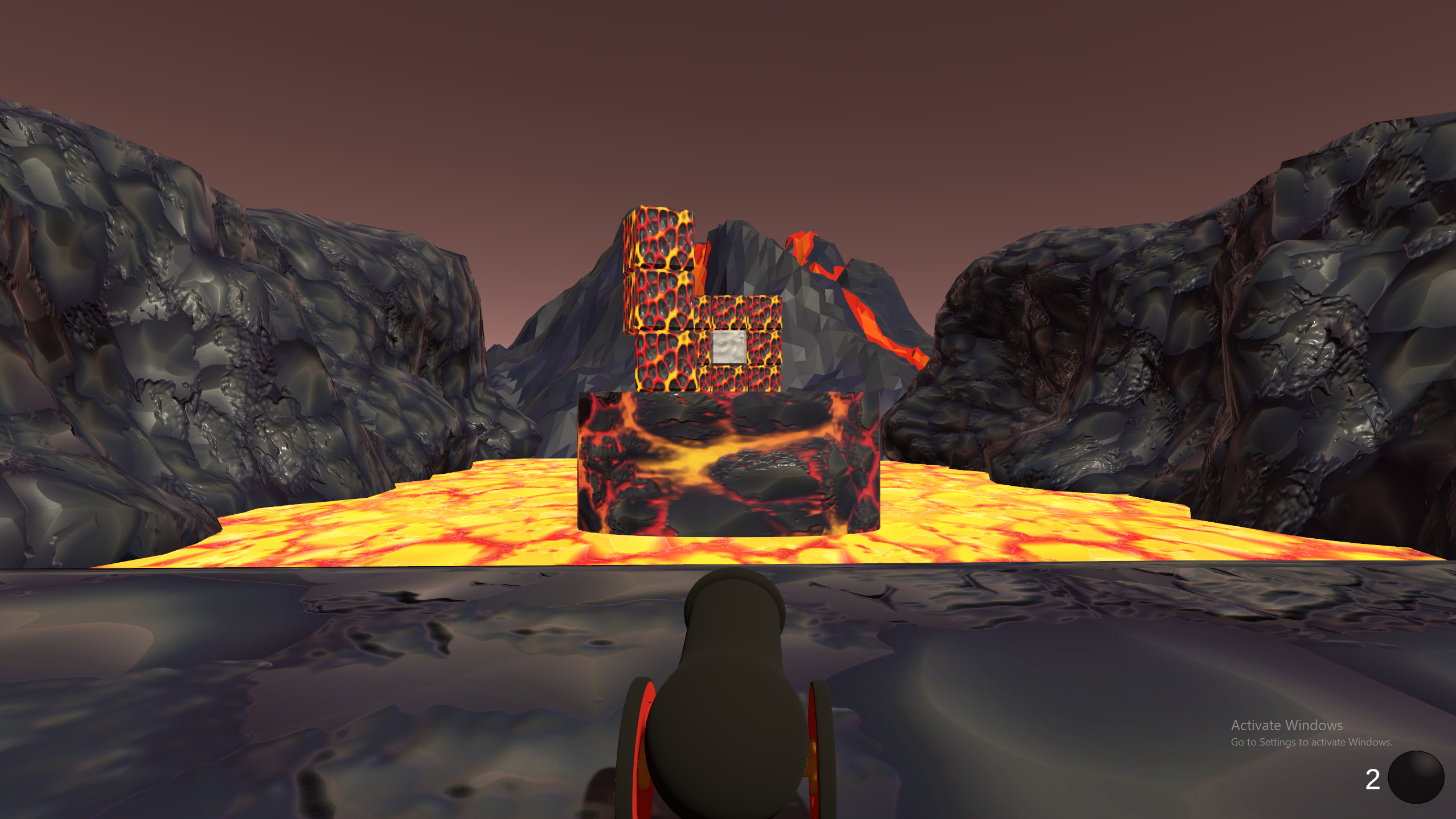 Level 2 — taller stacked lava block tower with offset blocks and a weak point target