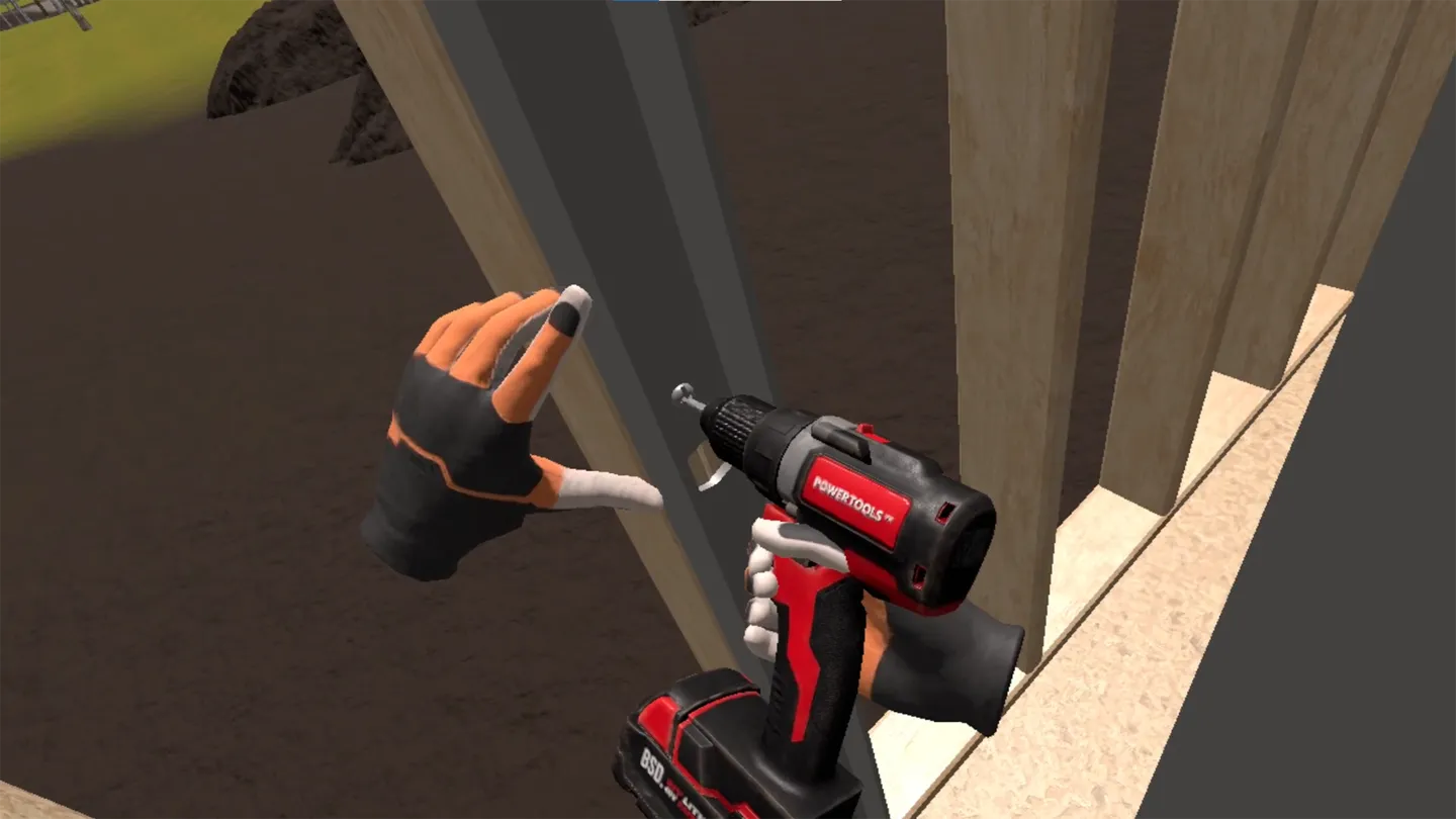 Close-up first-person drill driving screw into wooden stud framing