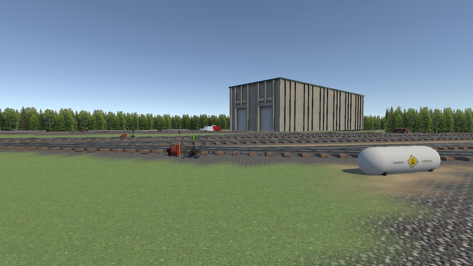 Markham yard track view with overpass bridge structure spanning dual track corridor